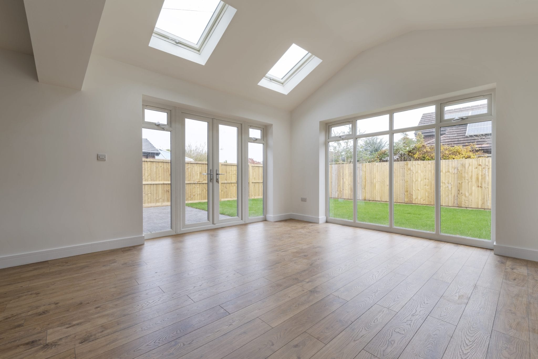 large living space with french doors and full length glazing